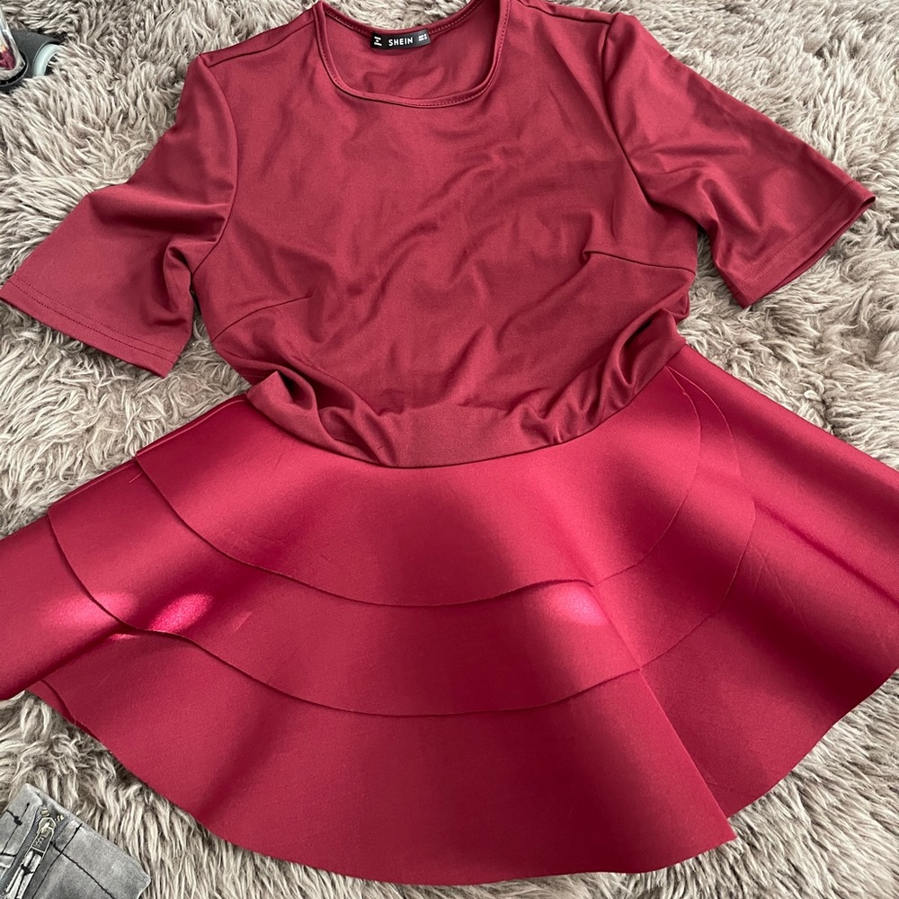 Baby doll blouse in maroon color.